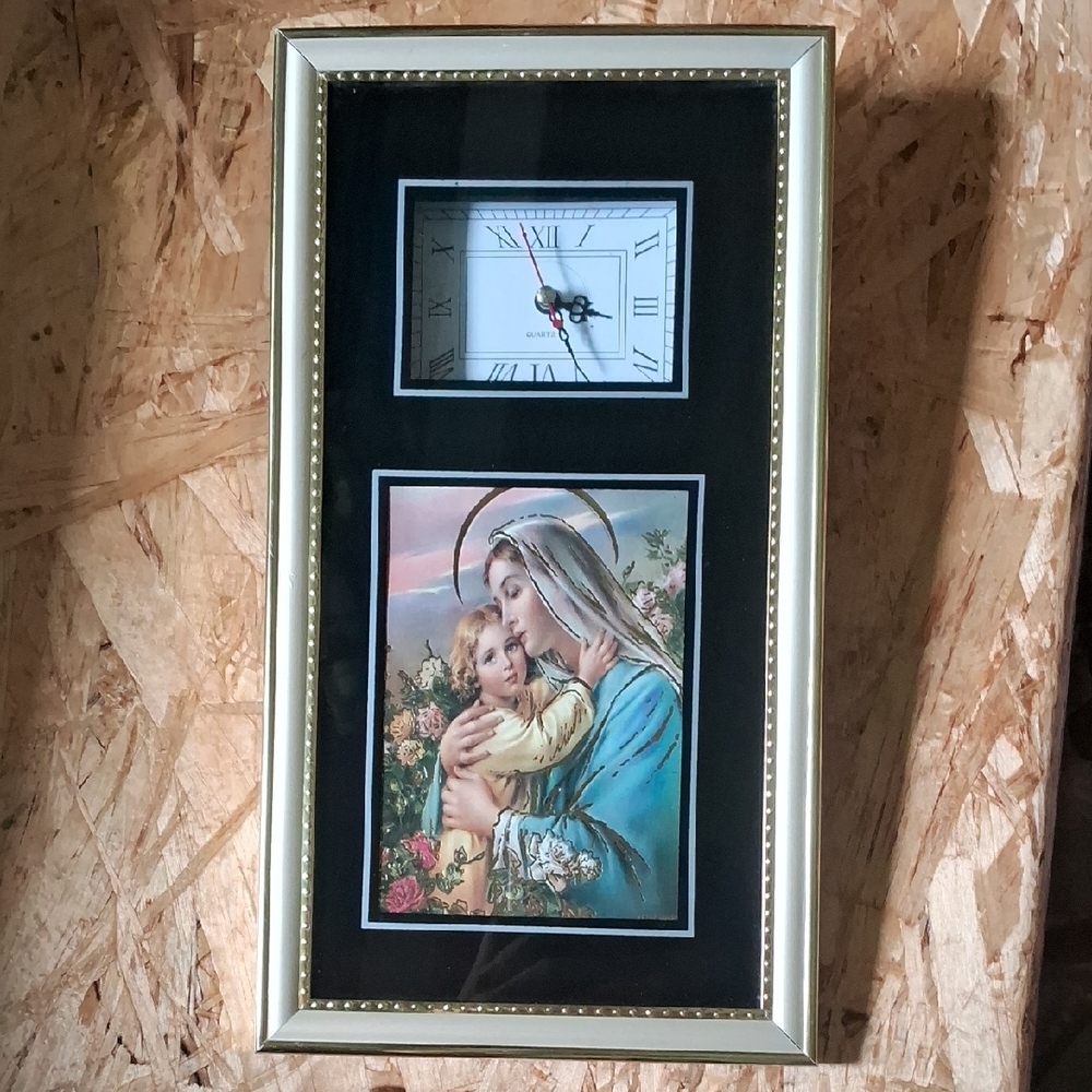 Elegant Gold and Black Religious Clock